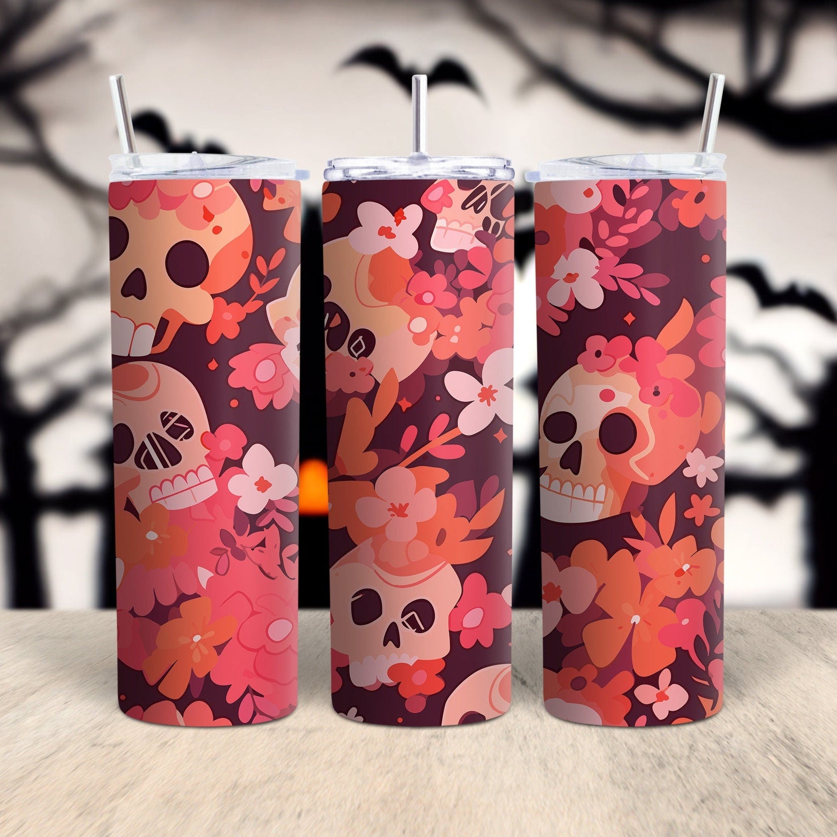 A set of three digital artwork files featuring gothic-style skull patterns with pink and orange floral elements on a dark background, intended for use in sublimation printing on tumblers or other surfaces.